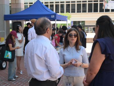 Principal Building Code Specialist Lilia Grigoryan connects with fellow City staff about the importance of building safety.