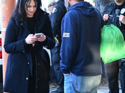 Homeless Services staff asking a homeless individual questions during the 2026 Homeless Count in Glendale.