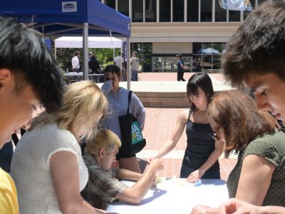 Local students engage in a building activity at an annual vendor fair at the Glendale Civic Center in 2025.